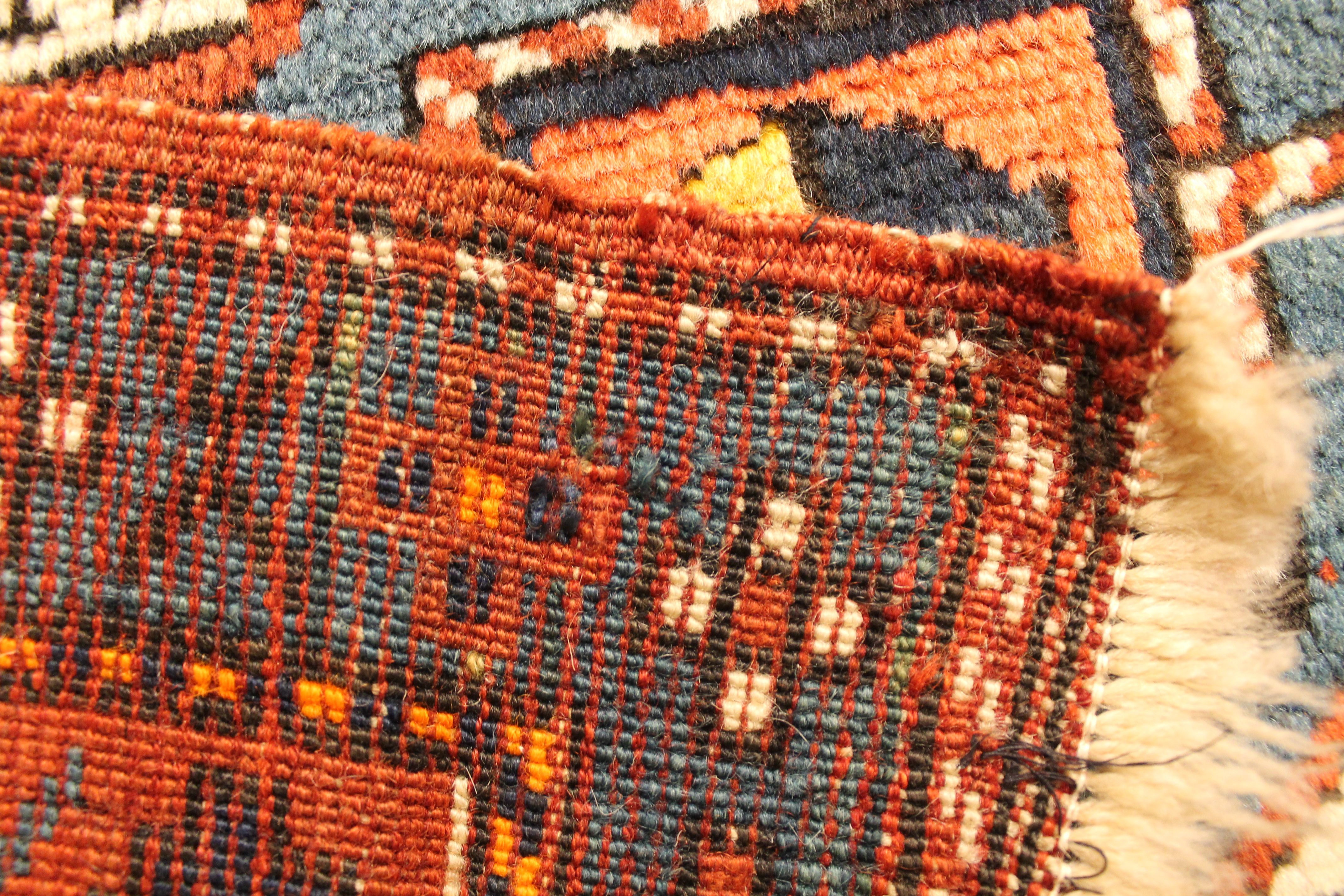 Antique Kazak rug